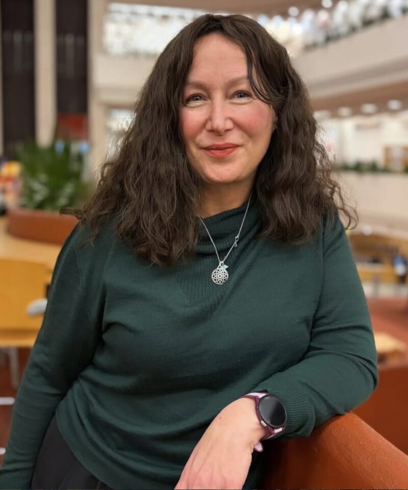 Beingmarci image of a woman in a green shirt